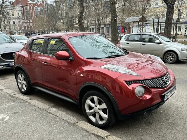 Червоний Ніссан Жук, об'ємом двигуна 1.6 л та пробігом 107 тис. км за 9600 $, фото 1 на Automoto.ua