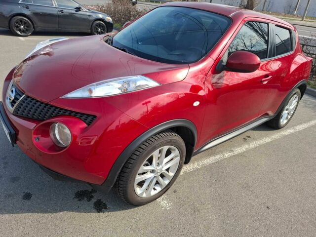 Красный Ниссан Жук, объемом двигателя 1.6 л и пробегом 128 тыс. км за 10699 $, фото 1 на Automoto.ua