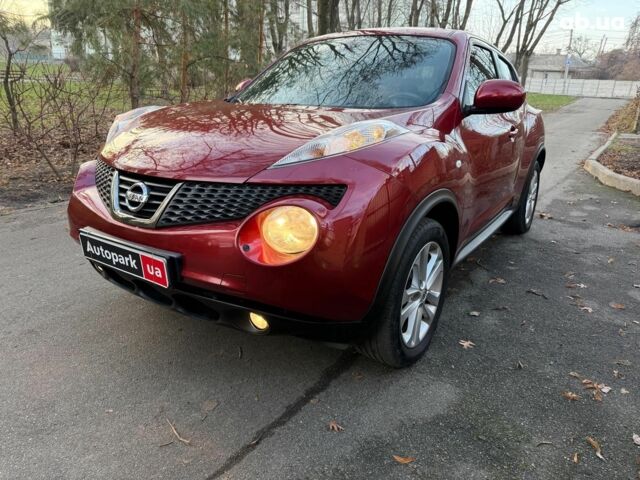 Червоний Ніссан Жук, об'ємом двигуна 1.6 л та пробігом 106 тис. км за 10390 $, фото 1 на Automoto.ua