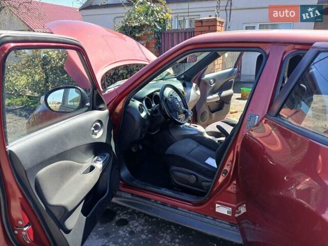 Красный Ниссан Жук, объемом двигателя 1.62 л и пробегом 170 тыс. км за 8999 $, фото 1 на Automoto.ua