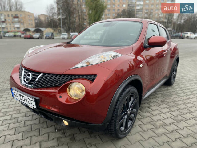 Красный Ниссан Жук, объемом двигателя 1.6 л и пробегом 119 тыс. км за 11000 $, фото 1 на Automoto.ua
