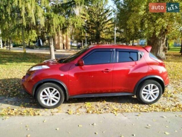 Красный Ниссан Жук, объемом двигателя 1.6 л и пробегом 267 тыс. км за 9700 $, фото 1 на Automoto.ua