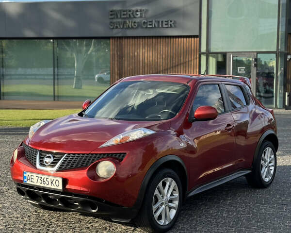 Красный Ниссан Жук, объемом двигателя 1.6 л и пробегом 144 тыс. км за 7899 $, фото 1 на Automoto.ua