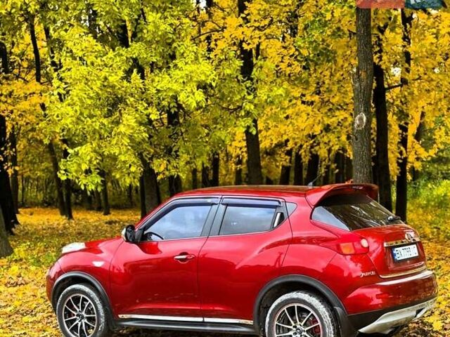 Красный Ниссан Жук, объемом двигателя 1.62 л и пробегом 131 тыс. км за 9900 $, фото 1 на Automoto.ua