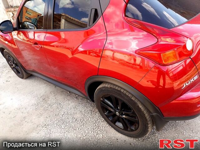 Красный Ниссан Жук, объемом двигателя 1.6 л и пробегом 117 тыс. км за 11100 $, фото 1 на Automoto.ua