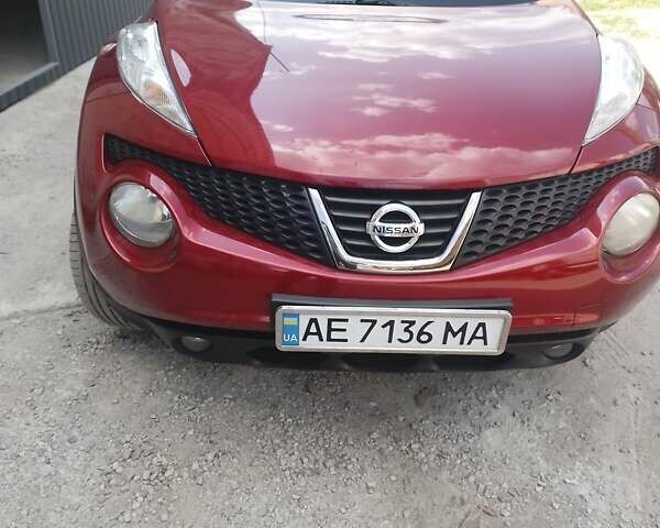 Красный Ниссан Жук, объемом двигателя 1.6 л и пробегом 117 тыс. км за 11100 $, фото 1 на Automoto.ua