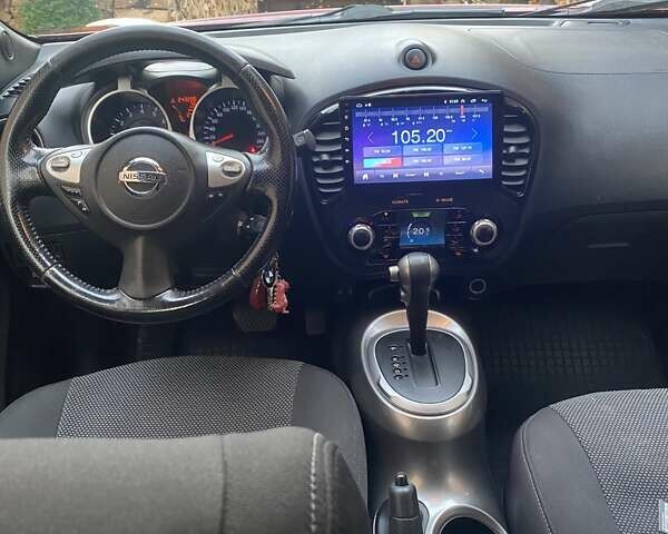 Красный Ниссан Жук, объемом двигателя 1.6 л и пробегом 243 тыс. км за 9800 $, фото 1 на Automoto.ua