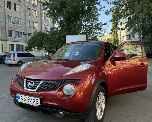 Красный Ниссан Жук, объемом двигателя 1.6 л и пробегом 123 тыс. км за 9950 $, фото 1 на Automoto.ua