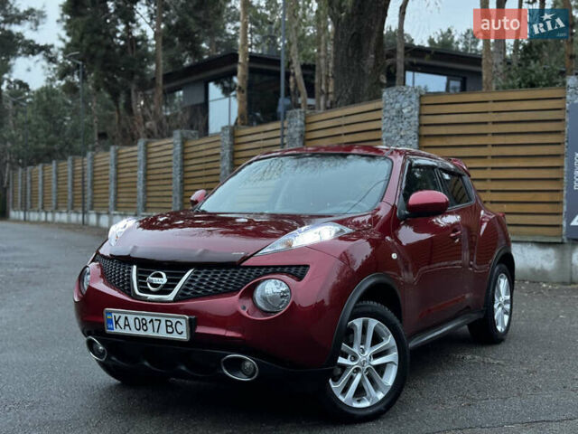 Червоний Ніссан Жук, об'ємом двигуна 1.6 л та пробігом 97 тис. км за 10750 $, фото 1 на Automoto.ua