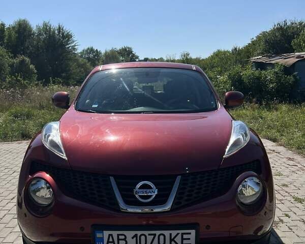 Красный Ниссан Жук, объемом двигателя 1.6 л и пробегом 125 тыс. км за 9700 $, фото 1 на Automoto.ua