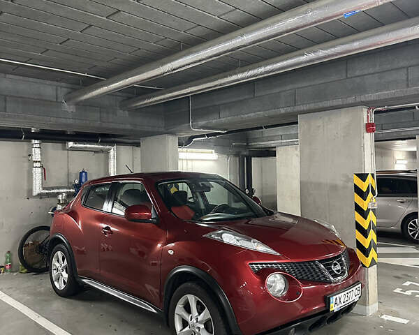 Красный Ниссан Жук, объемом двигателя 1.6 л и пробегом 181 тыс. км за 10499 $, фото 1 на Automoto.ua