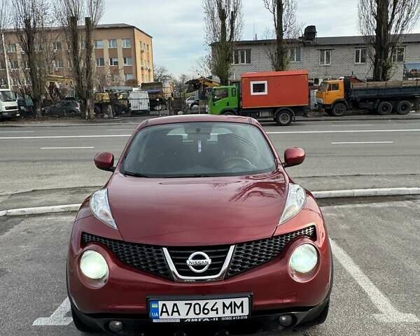 Красный Ниссан Жук, объемом двигателя 1.6 л и пробегом 117 тыс. км за 9900 $, фото 1 на Automoto.ua