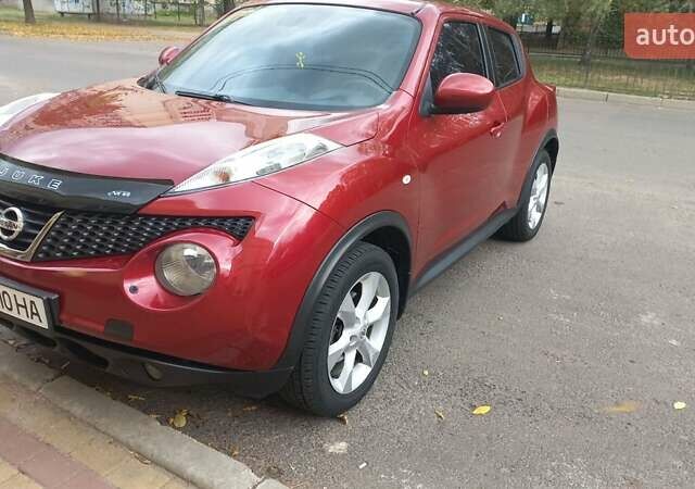 Червоний Ніссан Жук, об'ємом двигуна 1.6 л та пробігом 199 тис. км за 9700 $, фото 1 на Automoto.ua