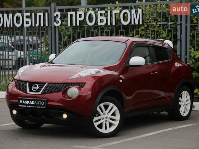 Красный Ниссан Жук, объемом двигателя 1.62 л и пробегом 154 тыс. км за 9900 $, фото 1 на Automoto.ua