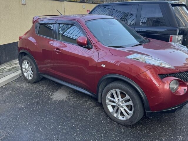 Червоний Ніссан Жук, об'ємом двигуна 1.6 л та пробігом 120 тис. км за 10500 $, фото 1 на Automoto.ua