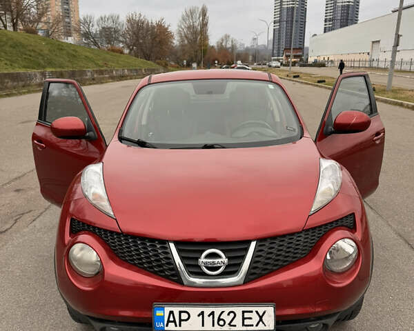 Червоний Ніссан Жук, об'ємом двигуна 1.6 л та пробігом 86 тис. км за 9999 $, фото 1 на Automoto.ua