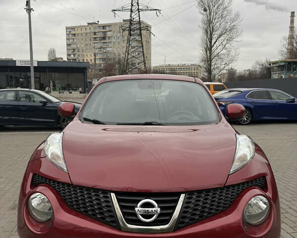 Червоний Ніссан Жук, об'ємом двигуна 1.6 л та пробігом 166 тис. км за 9600 $, фото 1 на Automoto.ua