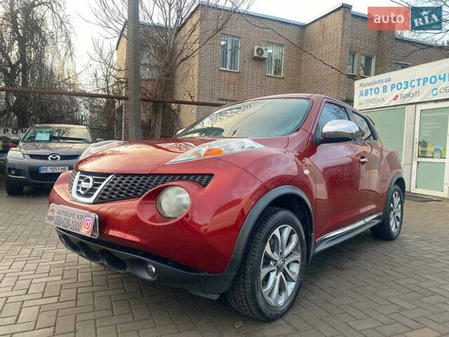 Красный Ниссан Жук, объемом двигателя 1.6 л и пробегом 172 тыс. км за 10300 $, фото 1 на Automoto.ua