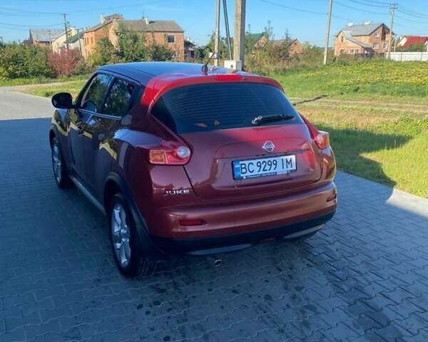 Червоний Ніссан Жук, об'ємом двигуна 1.6 л та пробігом 105 тис. км за 11450 $, фото 1 на Automoto.ua