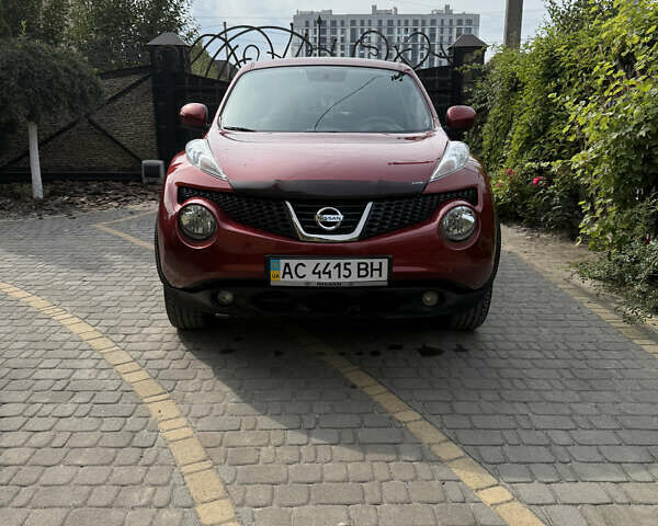 Червоний Ніссан Жук, об'ємом двигуна 1.6 л та пробігом 75 тис. км за 10200 $, фото 1 на Automoto.ua