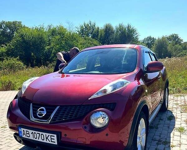 Червоний Ніссан Жук, об'ємом двигуна 1.6 л та пробігом 125 тис. км за 9700 $, фото 1 на Automoto.ua