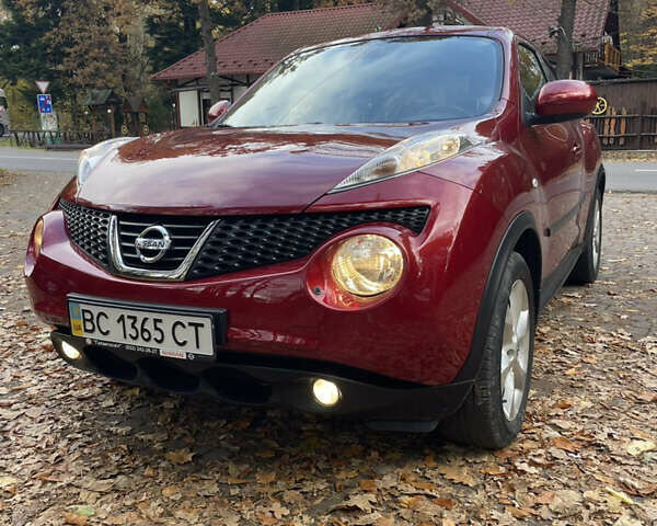 Красный Ниссан Жук, объемом двигателя 1.6 л и пробегом 98 тыс. км за 11500 $, фото 1 на Automoto.ua