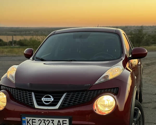 Красный Ниссан Жук, объемом двигателя 1.6 л и пробегом 168 тыс. км за 10900 $, фото 1 на Automoto.ua