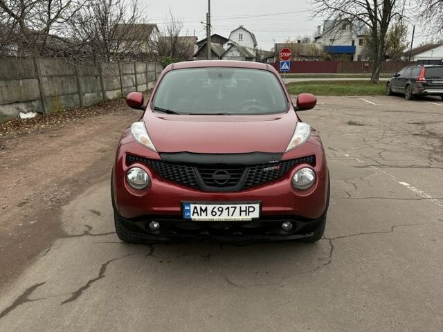 Красный Ниссан Жук, объемом двигателя 1.6 л и пробегом 214 тыс. км за 9000 $, фото 1 на Automoto.ua