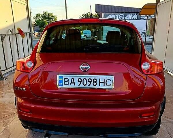Красный Ниссан Жук, объемом двигателя 1.6 л и пробегом 150 тыс. км за 10200 $, фото 1 на Automoto.ua
