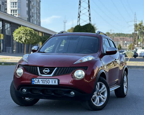 Красный Ниссан Жук, объемом двигателя 1.6 л и пробегом 198 тыс. км за 8300 $, фото 1 на Automoto.ua