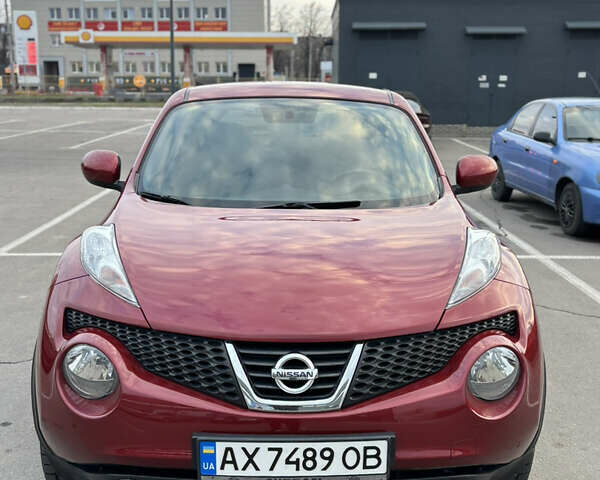Червоний Ніссан Жук, об'ємом двигуна 1.6 л та пробігом 127 тис. км за 9700 $, фото 1 на Automoto.ua