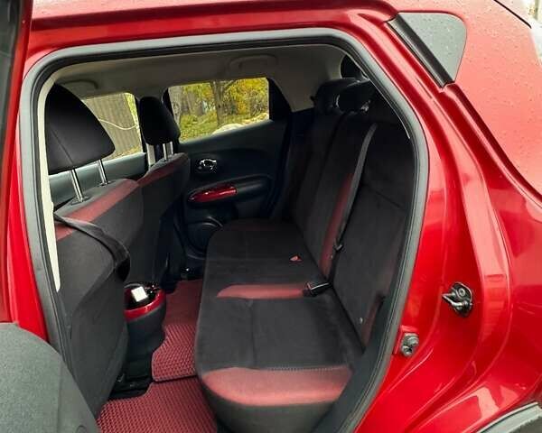 Червоний Ніссан Жук, об'ємом двигуна 1.6 л та пробігом 211 тис. км за 10500 $, фото 1 на Automoto.ua