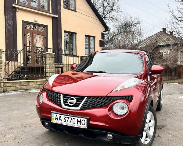 Червоний Ніссан Жук, об'ємом двигуна 1.6 л та пробігом 150 тис. км за 8250 $, фото 1 на Automoto.ua