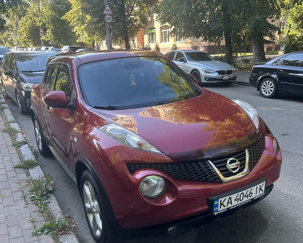 Червоний Ніссан Жук, об'ємом двигуна 1.6 л та пробігом 120 тис. км за 10000 $, фото 1 на Automoto.ua