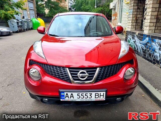 Красный Ниссан Жук, объемом двигателя 1.6 л и пробегом 130 тыс. км за 10700 $, фото 1 на Automoto.ua