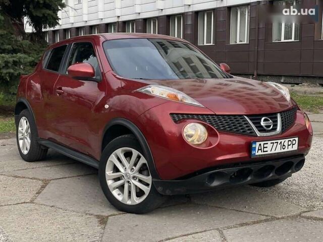 Красный Ниссан Жук, объемом двигателя 1.6 л и пробегом 188 тыс. км за 10500 $, фото 1 на Automoto.ua