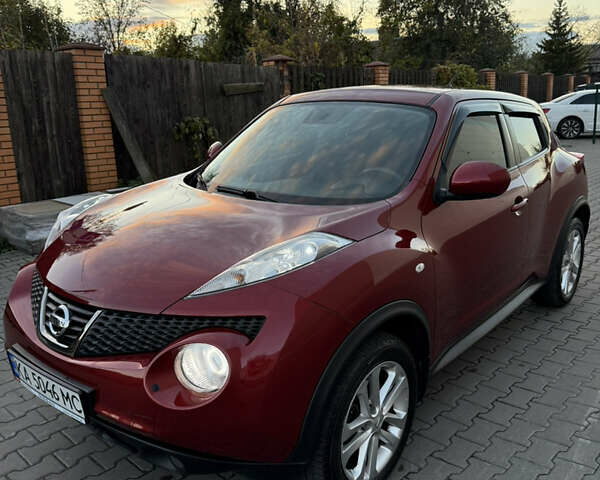 Червоний Ніссан Жук, об'ємом двигуна 1.6 л та пробігом 54 тис. км за 11800 $, фото 1 на Automoto.ua