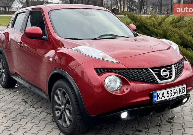 Красный Ниссан Жук, объемом двигателя 1.6 л и пробегом 152 тыс. км за 10350 $, фото 1 на Automoto.ua