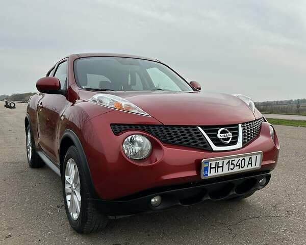 Красный Ниссан Жук, объемом двигателя 1.6 л и пробегом 219 тыс. км за 10200 $, фото 1 на Automoto.ua