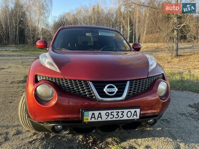 Красный Ниссан Жук, объемом двигателя 1.6 л и пробегом 105 тыс. км за 11300 $, фото 1 на Automoto.ua