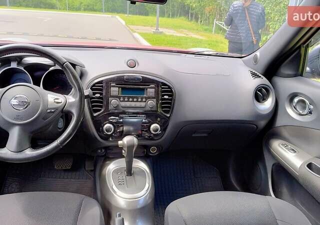 Червоний Ніссан Жук, об'ємом двигуна 1.6 л та пробігом 114 тис. км за 11000 $, фото 1 на Automoto.ua