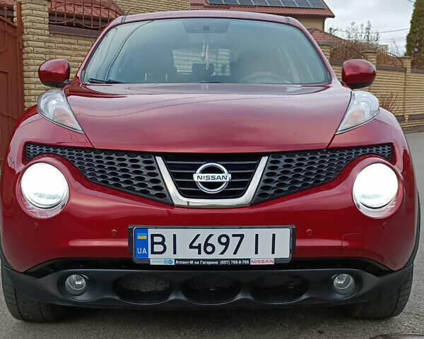 Червоний Ніссан Жук, об'ємом двигуна 1.6 л та пробігом 66 тис. км за 11000 $, фото 1 на Automoto.ua