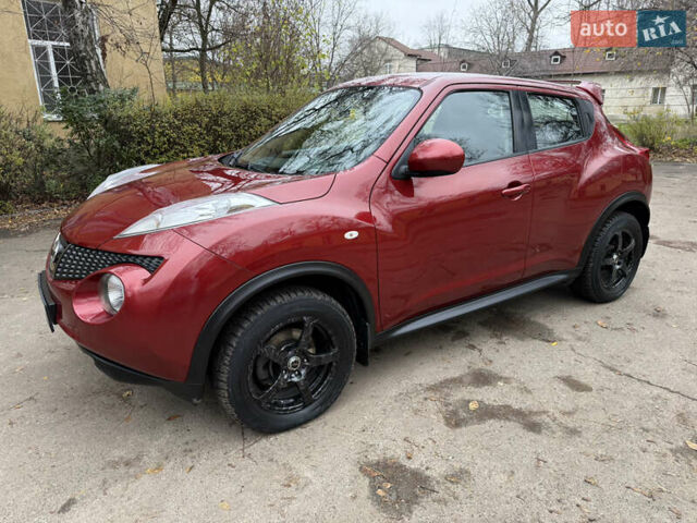 Красный Ниссан Жук, объемом двигателя 1.6 л и пробегом 130 тыс. км за 10500 $, фото 1 на Automoto.ua