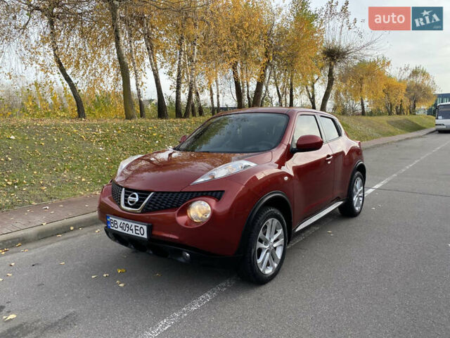 Красный Ниссан Жук, объемом двигателя 1.62 л и пробегом 68 тыс. км за 12200 $, фото 1 на Automoto.ua
