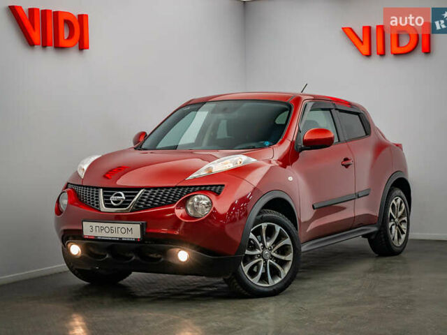 Красный Ниссан Жук, объемом двигателя 1.6 л и пробегом 84 тыс. км за 12272 $, фото 1 на Automoto.ua