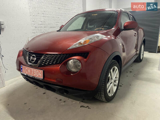 Красный Ниссан Жук, объемом двигателя 1.6 л и пробегом 165 тыс. км за 8200 $, фото 1 на Automoto.ua