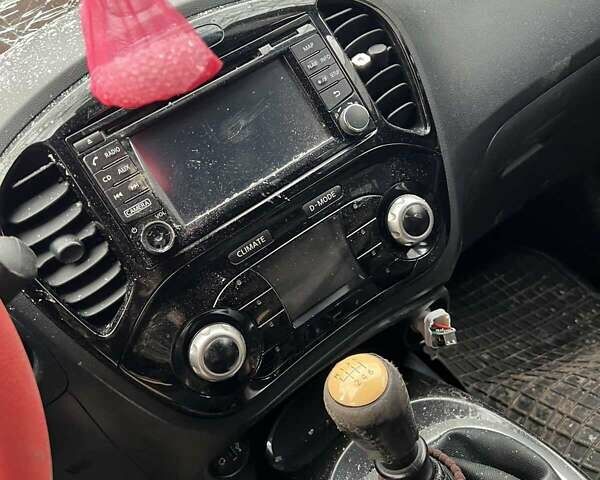 Красный Ниссан Жук, объемом двигателя 1.46 л и пробегом 130 тыс. км за 3500 $, фото 1 на Automoto.ua