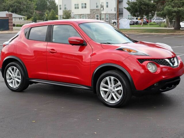 Красный Ниссан Жук, объемом двигателя 1.6 л и пробегом 78 тыс. км за 6000 $, фото 1 на Automoto.ua