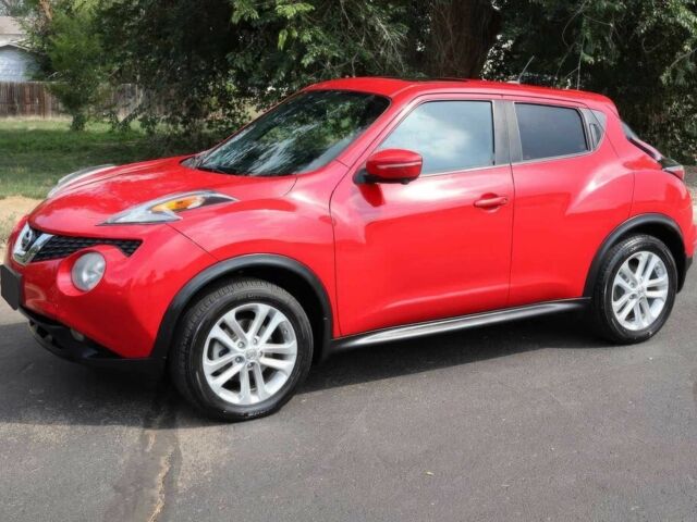 Красный Ниссан Жук, объемом двигателя 1.6 л и пробегом 72 тыс. км за 3500 $, фото 1 на Automoto.ua