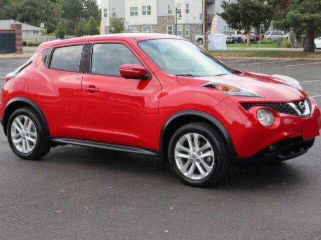 Красный Ниссан Жук, объемом двигателя 1.6 л и пробегом 72 тыс. км за 8000 $, фото 1 на Automoto.ua